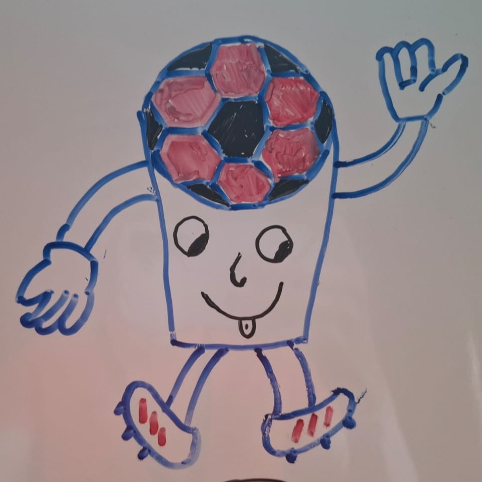 Child's drawing of a waving soccer-ball-headed mascot with a cup-shaped body