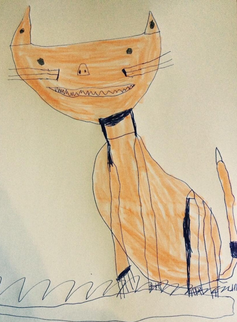 Child's drawing of a grinning orange cat with sharp teeth sitting on grass